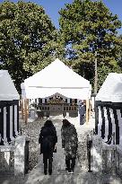 People offer prayers at Princess Yuriko's tomb