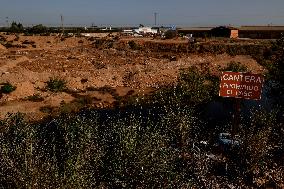 DANA Debris Accumulate In Quarry - Spain