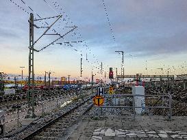 Rail Traffic At Sunset Near Munich Central Station