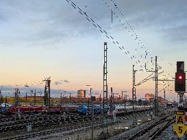 Rail Traffic At Sunset Near Munich Central Station