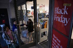 DC: People  hold a Black Friday shopping mall