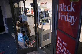 DC: People  hold a Black Friday shopping mall