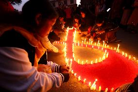 Nepal Marks “World AIDS Day” Eve With Candle Light Vigil