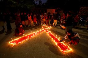 Nepal Marks “World AIDS Day” Eve With Candle Light Vigil