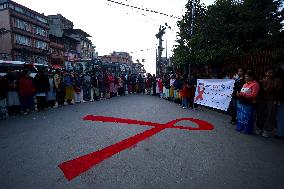 Nepal Marks “World AIDS Day” Eve With Candle Light Vigil