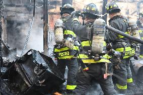 Large Fire Impacts Several Businesses In A Strip Mall On Small Business Saturday In The Rego Park Section Of Queens New York