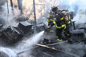 Large Fire Impacts Several Businesses In A Strip Mall On Small Business Saturday In The Rego Park Section Of Queens New York