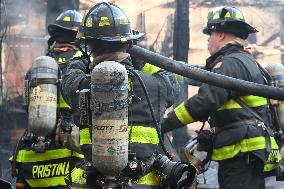 Large Fire Impacts Several Businesses In A Strip Mall On Small Business Saturday In The Rego Park Section Of Queens New York