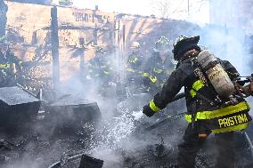 Large Fire Impacts Several Businesses In A Strip Mall On Small Business Saturday In The Rego Park Section Of Queens New York