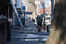 Large Fire Impacts Several Businesses In A Strip Mall On Small Business Saturday In The Rego Park Section Of Queens New York