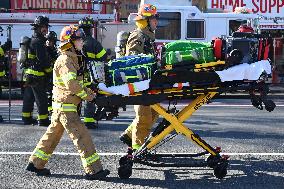 Large Fire Impacts Several Businesses In A Strip Mall On Small Business Saturday In The Rego Park Section Of Queens New York