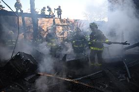 Large Fire Impacts Several Businesses In A Strip Mall On Small Business Saturday In The Rego Park Section Of Queens New York