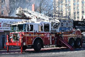 Large Fire Impacts Several Businesses In A Strip Mall On Small Business Saturday In The Rego Park Section Of Queens New York