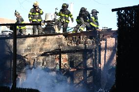 Large Fire Impacts Several Businesses In A Strip Mall On Small Business Saturday In The Rego Park Section Of Queens New York