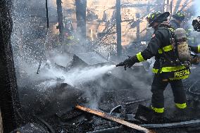 Large Fire Impacts Several Businesses In A Strip Mall On Small Business Saturday In The Rego Park Section Of Queens New York