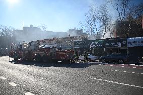 Large Fire Impacts Several Businesses In A Strip Mall On Small Business Saturday In The Rego Park Section Of Queens New York