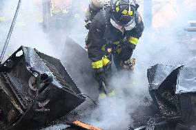 Large Fire Impacts Several Businesses In A Strip Mall On Small Business Saturday In The Rego Park Section Of Queens New York