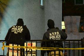 NYPD Crime Scene Investigators Search For Evidence At Scene Of Fatal Assault In Throggs Neck Section Of Bronx New York