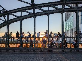 Young People Enjoying The Sunset At Hackerbruecke, Munich