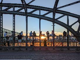 Young People Enjoying The Sunset At Hackerbruecke, Munich