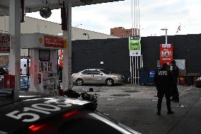 Two Men Stabbed During An Attempted Robbery Of A Vehicle At A Shell Gas Station In The Sunset Park Section Of Brooklyn New York