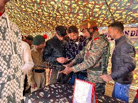 Indian Army Officials Display Weapons