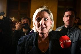 Marine Le Pen speaks to the press after the motions of censure at the National Assembly in Paris FA