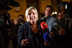 Marine Le Pen speaks to the press after the motions of censure at the National Assembly in Paris FA