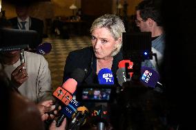 Marine Le Pen speaks to the press after the motions of censure at the National Assembly in Paris FA