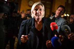 Marine Le Pen speaks to the press after the motions of censure at the National Assembly in Paris FA