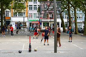 Youngsters Enjoy Basketball In A Antwerp Urban Playground