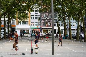 Youngsters Enjoy Basketball In A Antwerp Urban Playground