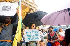 Demonstrators Shout Slogans As They Take Part In A Protest