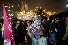 Demonstrators Shout Slogans As They Take Part In A Protest