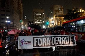 Demonstrators Shout Slogans As They Take Part In A Protest