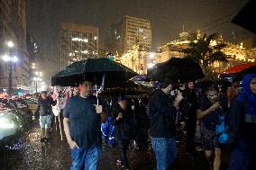 Demonstrators Shout Slogans As They Take Part In A Protest