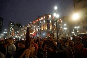 Demonstrators Shout Slogans As They Take Part In A Protest