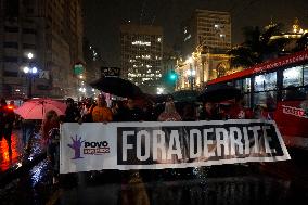 Demonstrators Shout Slogans As They Take Part In A Protest