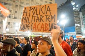 Demonstrators Shout Slogans As They Take Part In A Protest