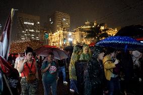 Demonstrators Shout Slogans As They Take Part In A Protest