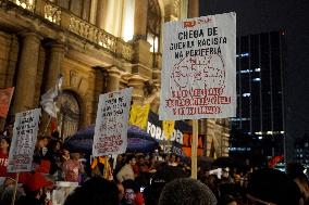 Demonstrators Shout Slogans As They Take Part In A Protest