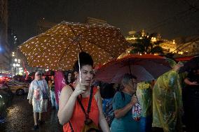 Demonstrators Shout Slogans As They Take Part In A Protest