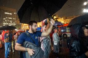 Demonstrators Shout Slogans As They Take Part In A Protest