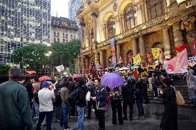 Demonstrators Shout Slogans As They Take Part In A Protest