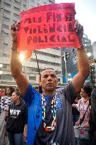 Demonstrators Shout Slogans As They Take Part In A Protest