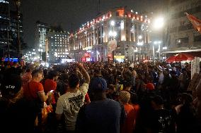 Demonstrators Shout Slogans As They Take Part In A Protest