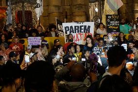 Demonstrators Shout Slogans As They Take Part In A Protest