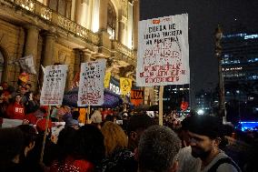 Demonstrators Shout Slogans As They Take Part In A Protest