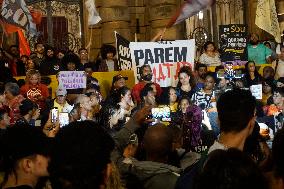 Demonstrators Shout Slogans As They Take Part In A Protest