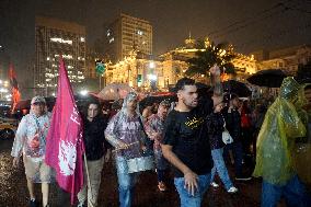 Demonstrators Shout Slogans As They Take Part In A Protest